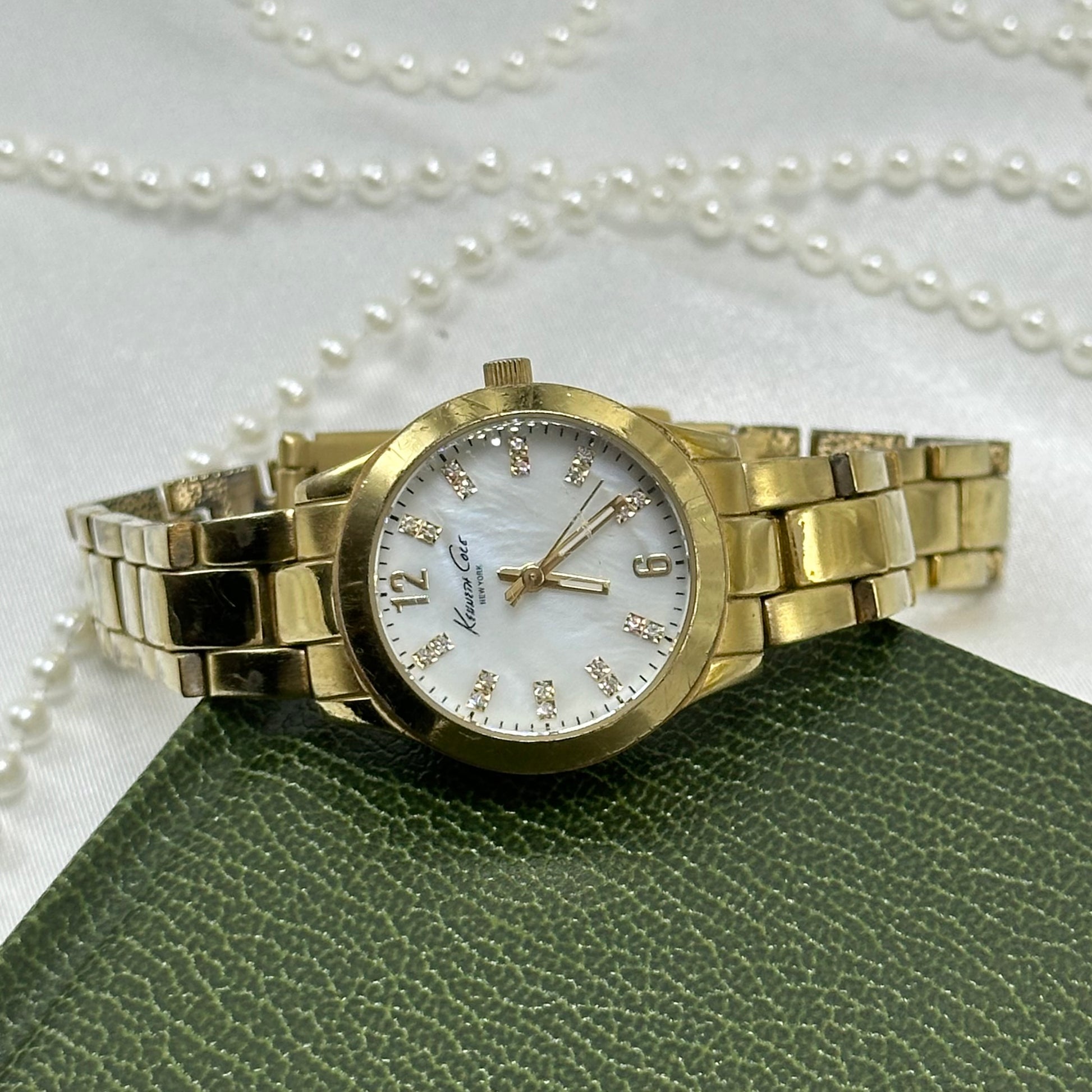 Gold Kenneth Cole Vintage Tank Watch with Mother of Pearl Dial