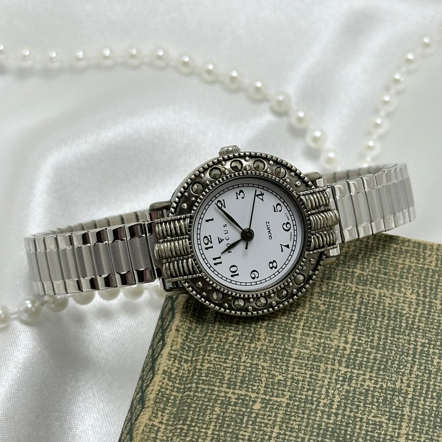 Round Marcasite Dial Silver Focus Watch