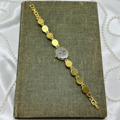 Gold Gruen Scarab Watch with Mother of Pearl Dial