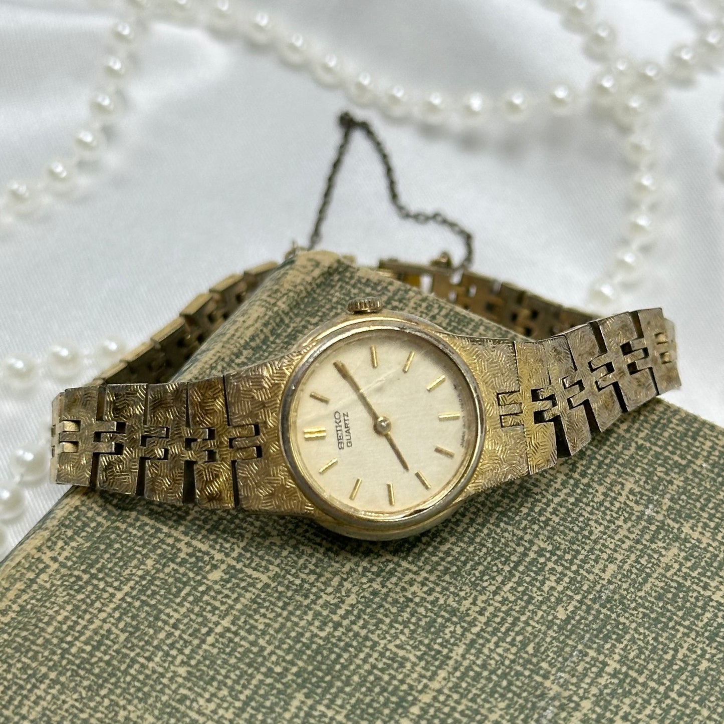 Dainty Gold Round Dial Seiko Watch