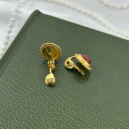 Gold Tone Oval Clip On Earrings with Red Stones
