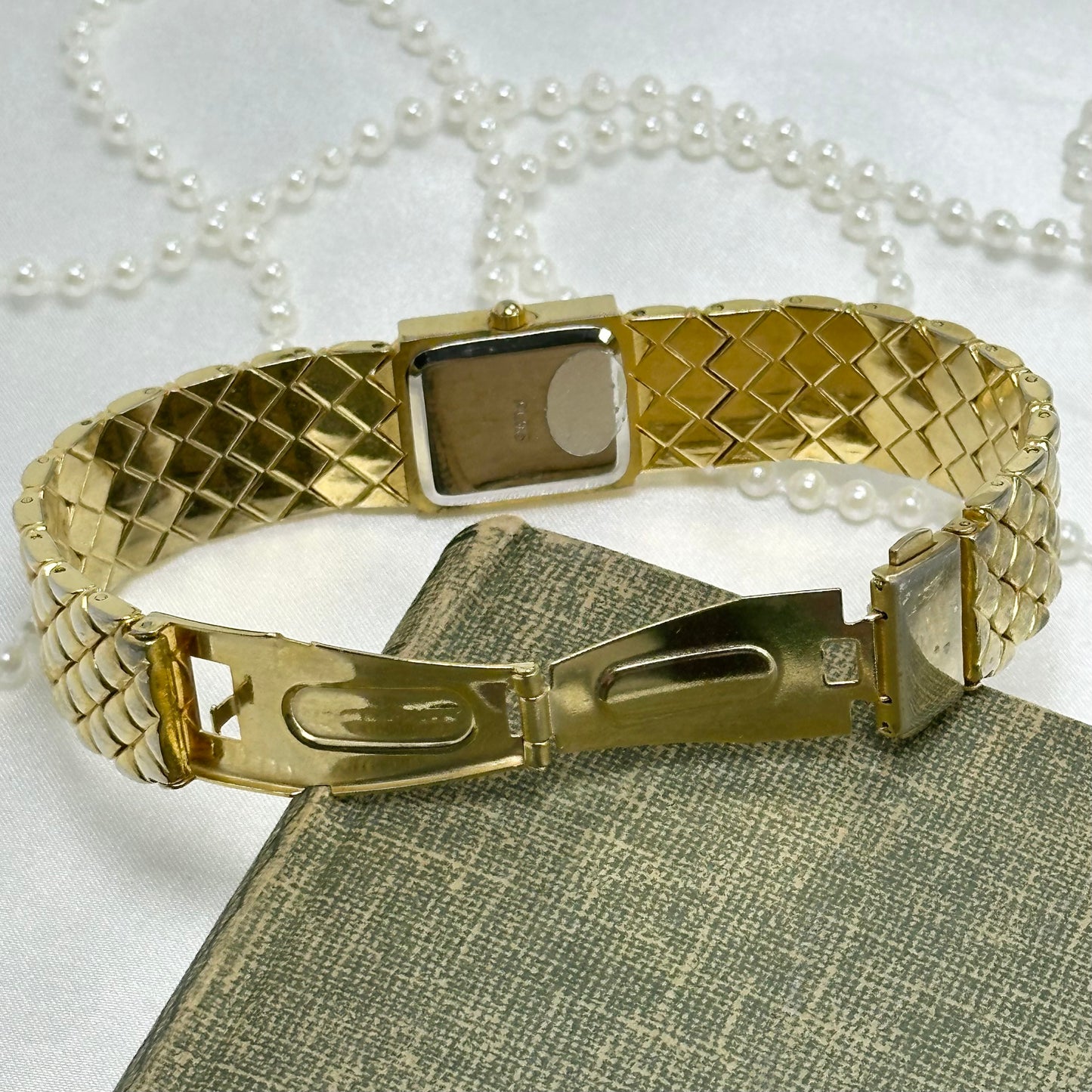 Luxury Gold Tank Watch with Quilted Band
