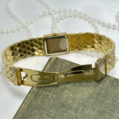 Luxury Gold Tank Watch with Quilted Band