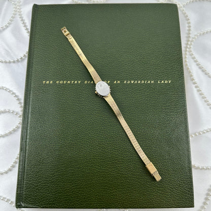 Elegant Gold Mathey Tissot Watch with Rubies and Diamonds