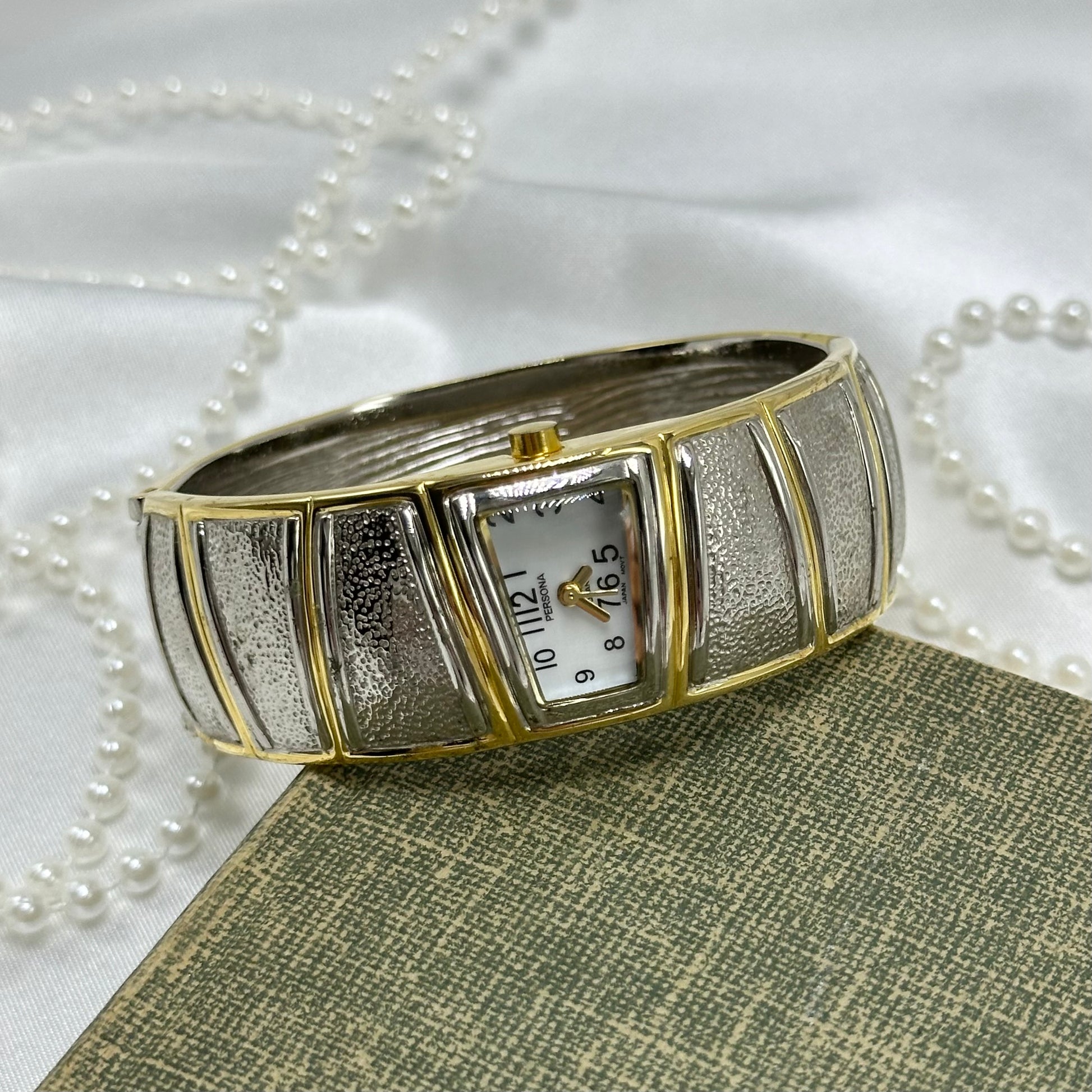 Sleek Two-Tone Cuff Watch