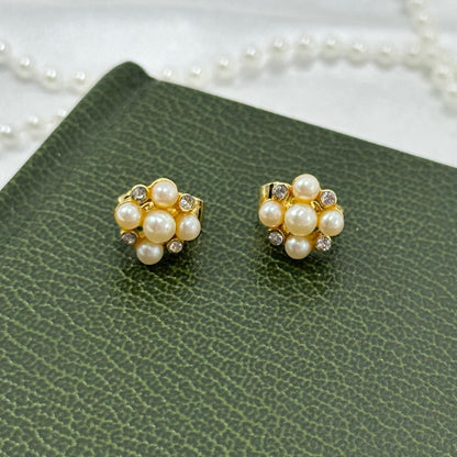Vintage gold tone faux pearl and crystal cluster clip on earrings.