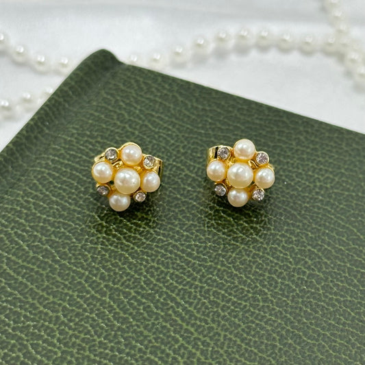 Vintage gold tone faux pearl and crystal cluster clip on earrings.