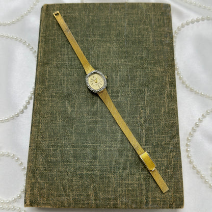Gold Diamanté Lucien Piccard Watch with Blue Jewel Crown