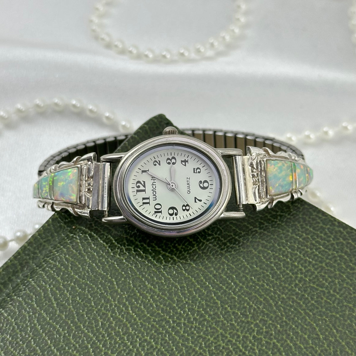 Native American style oval dial Watch-It watch with sterling silver and opal band.