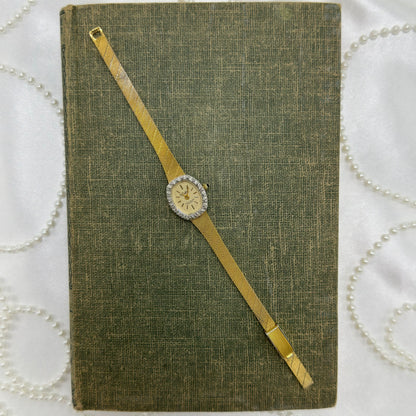 Gold Diamanté Lucien Piccard Watch with Blue Jewel Crown
