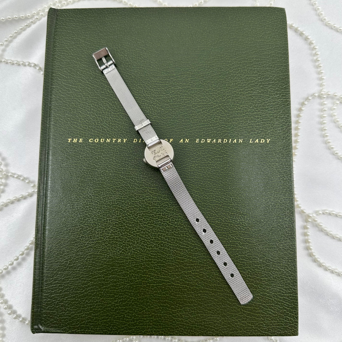 Dainty Silver Watch with Bubble Dial and Mesh Band