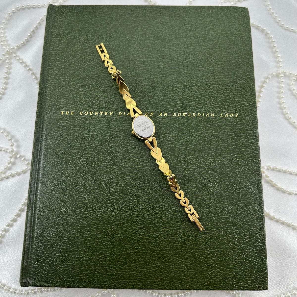 Adorable Gold Armitron Watch with Mother of Pearl Dial