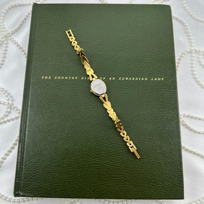 Adorable Gold Armitron Watch with Mother of Pearl Dial