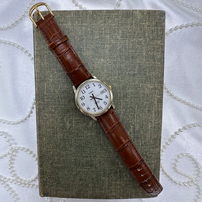 Gold and Brown Timex Indiglo Watch