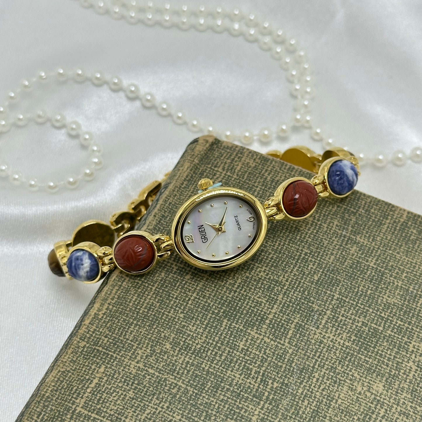 Gold Gruen Scarab Watch with Mother of Pearl Dial