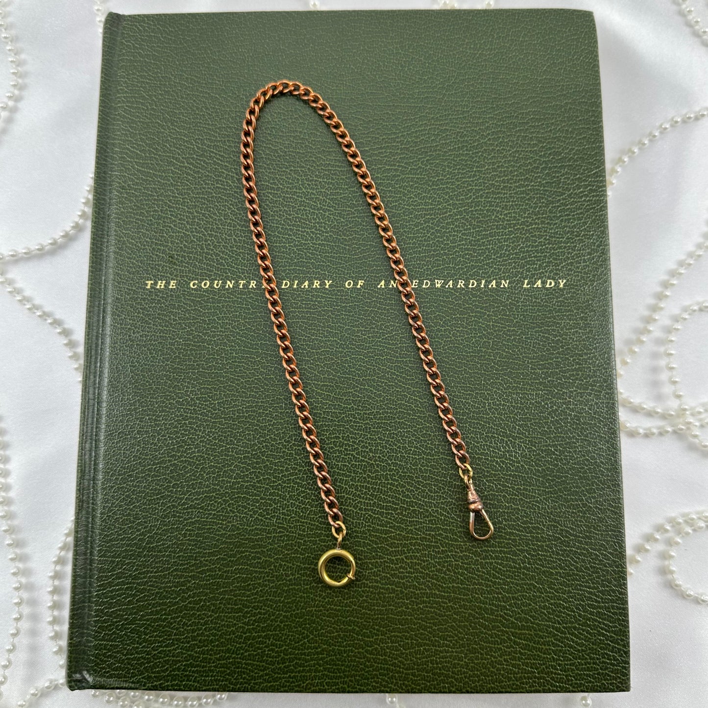 Vintage rose gold tone chunky curb watch chain with dog clip clasp.