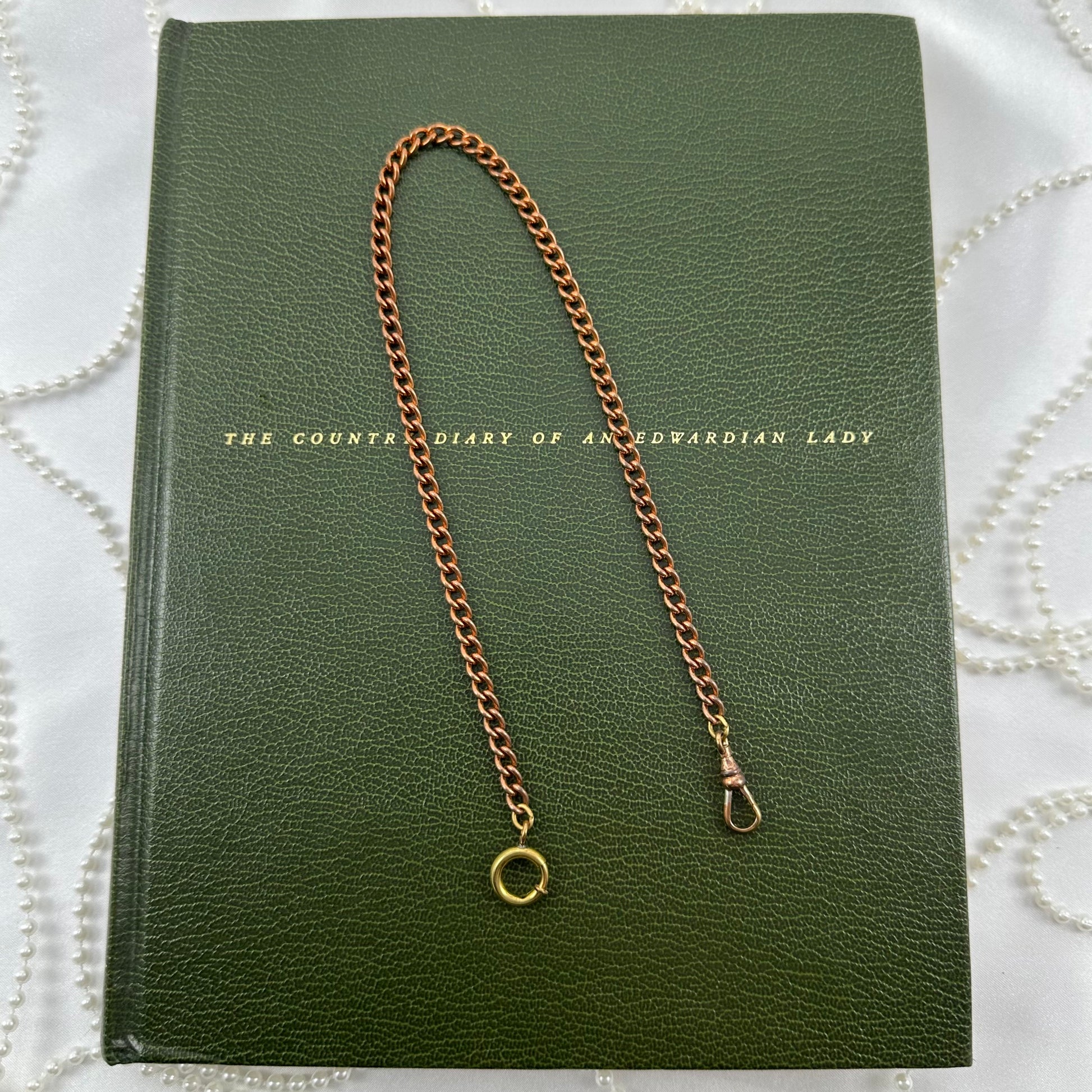 Vintage rose gold tone chunky curb watch chain with dog clip clasp.