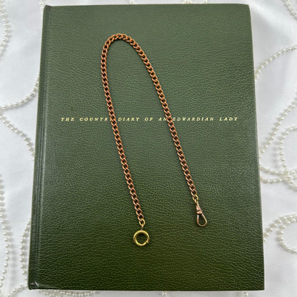 Vintage rose gold tone chunky curb watch chain with dog clip clasp.