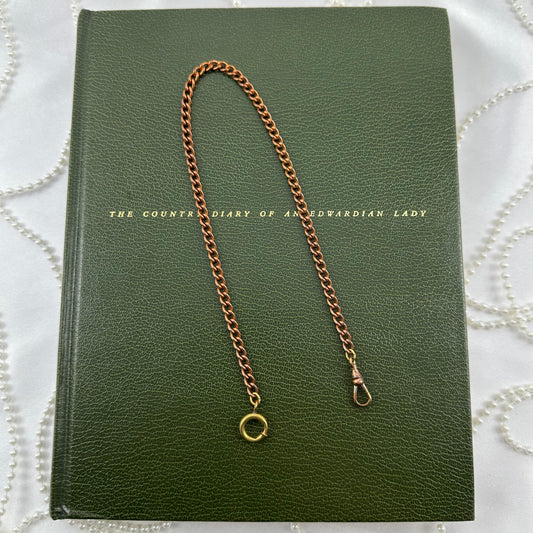 Vintage rose gold tone chunky curb watch chain with dog clip clasp.