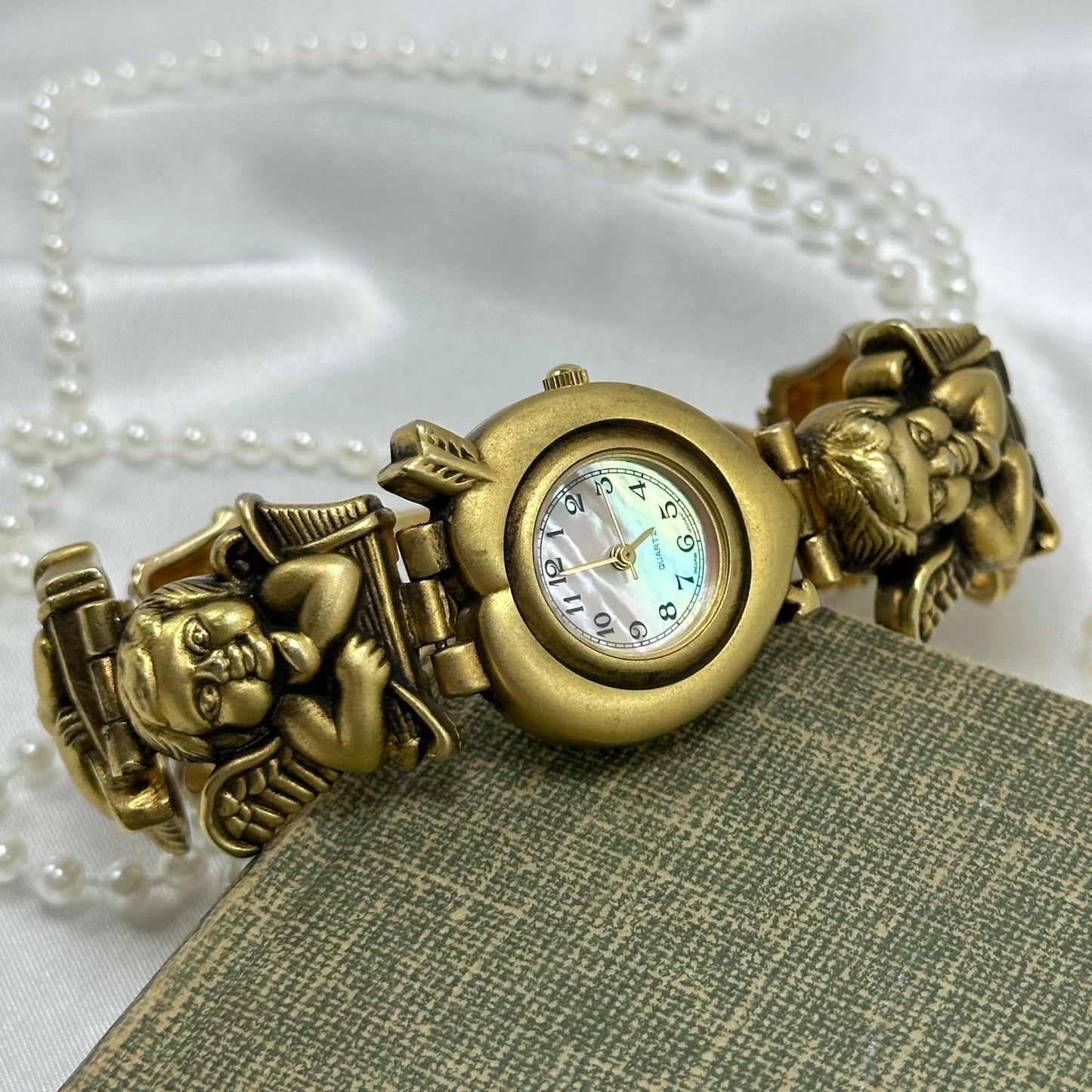 Rare Gold Slide Charm Cherub Watch with Mother of Pearl Heart Dial