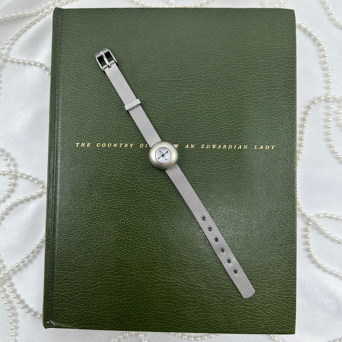 Dainty Silver Watch with Bubble Dial and Mesh Band