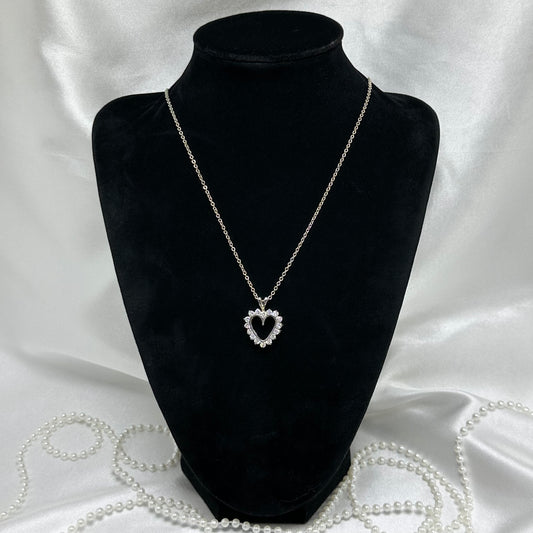 Vintage silver tone heart necklace with CZ stones.