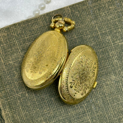 Gold Floral Locket Watch with Butterfly and Flower Picture