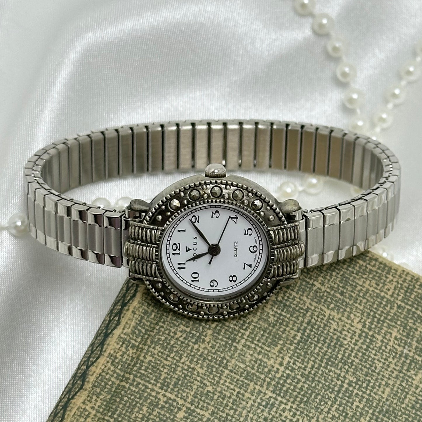 Round Marcasite Dial Silver Focus Watch