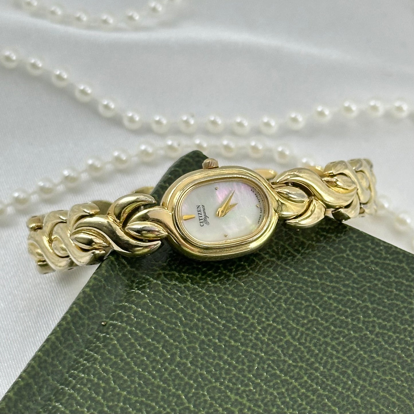 Dainty Gold Citizen Watch with Mother of Pearl Dial