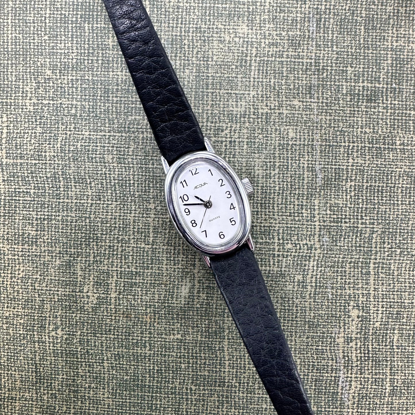 Vintage silver tone Acqua watch with slender black band