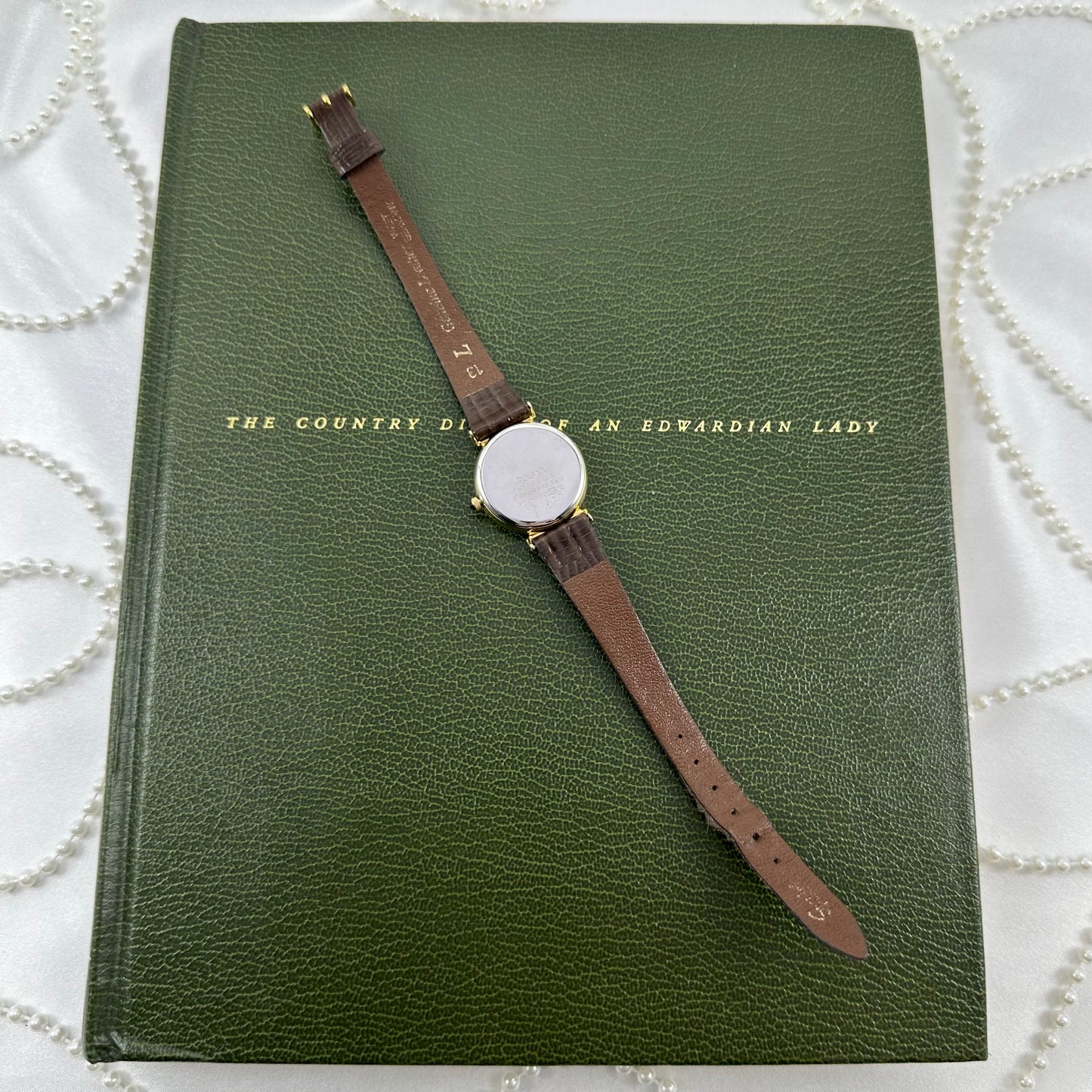 Vintage Gold Pulsar Watch with Brown Leather Band and Date Display