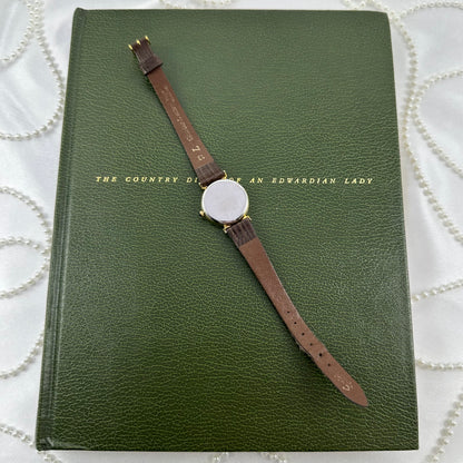 Vintage Gold Pulsar Watch with Brown Leather Band and Date Display