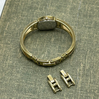 Gold Fossil Cuff Watch