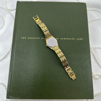 Queen's Court Gold Relic Watch with Crystal Accents and Date Display