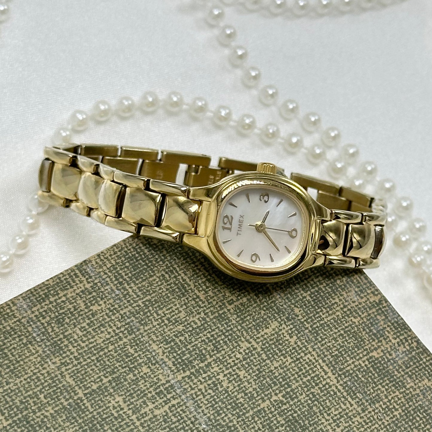 Gold Timex Watch with Mother of Pearl Dial