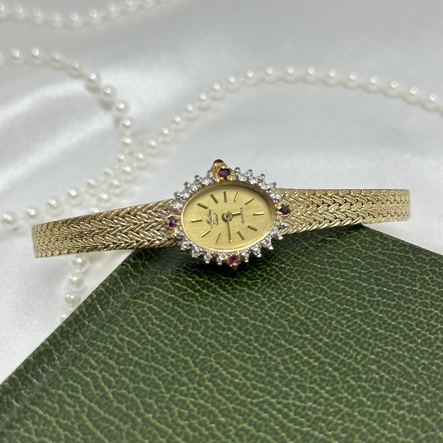 Elegant Gold Mathey Tissot Watch with Rubies and Diamonds