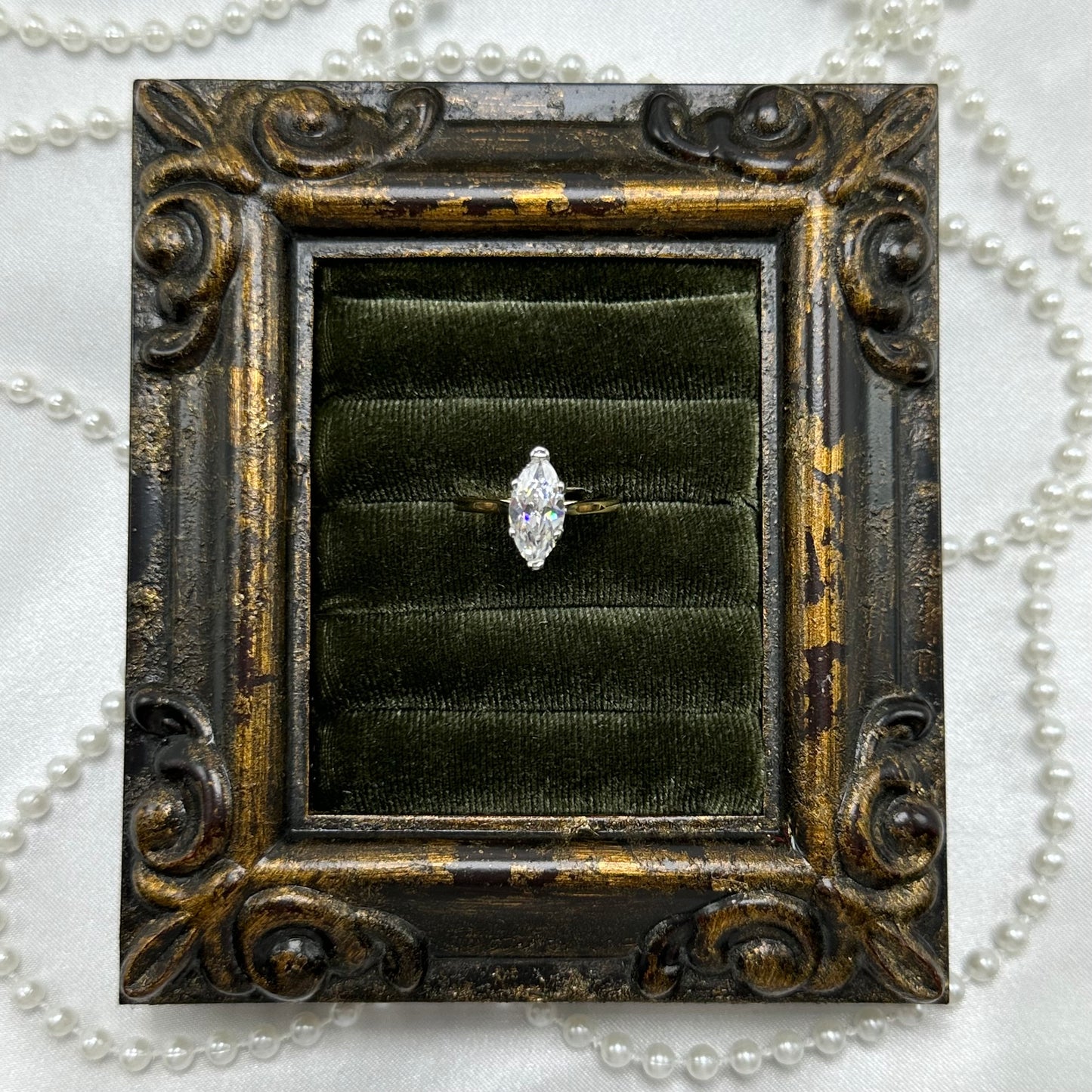 14k gold electroplated vintage deadstock ring with solitaire marquise clear cubic zirconia stone.