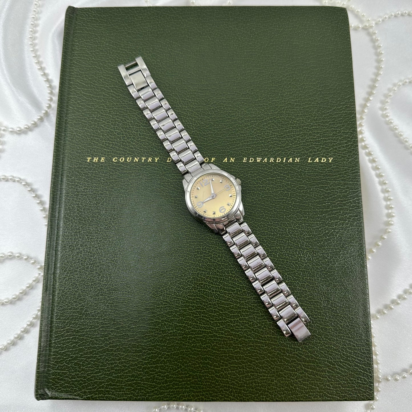 Silver Round Champagne Dial Watch