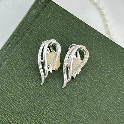 1958 Silver Swirl Sarah Coventry Clip On Earrings