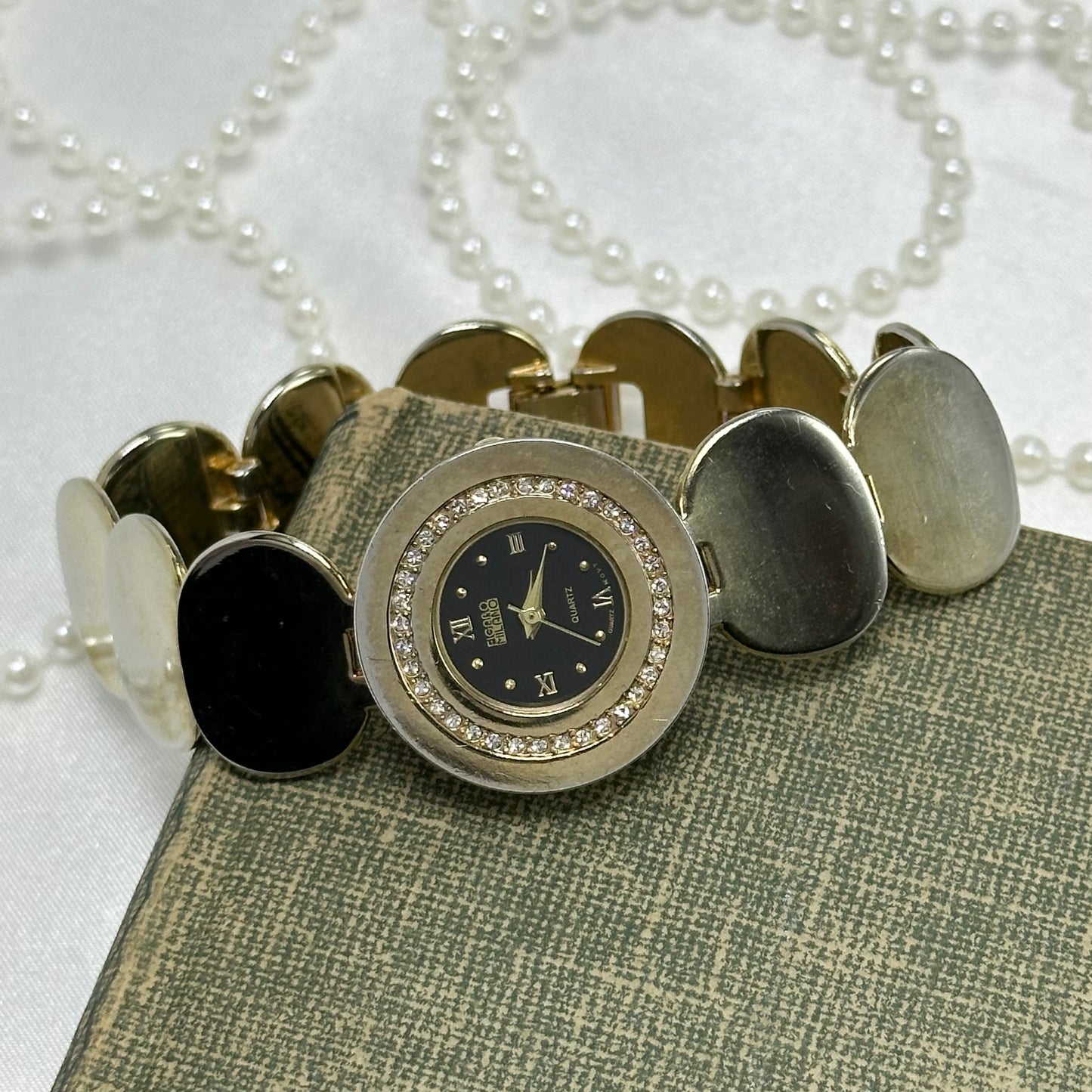 Two-Tone Coin Bracelet Watch with Black Diamanté Dial