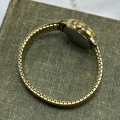 Simple Gold Round Dial Watch