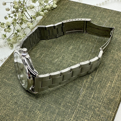 Chunky Silver Round Dial Tank Watch