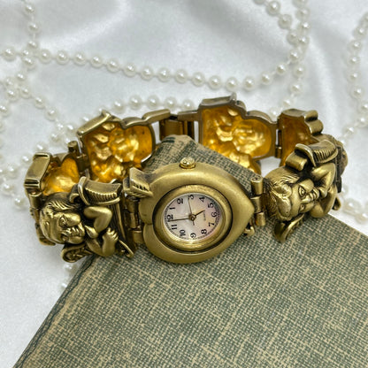 Rare Gold Slide Charm Cherub Watch with Mother of Pearl Heart Dial
