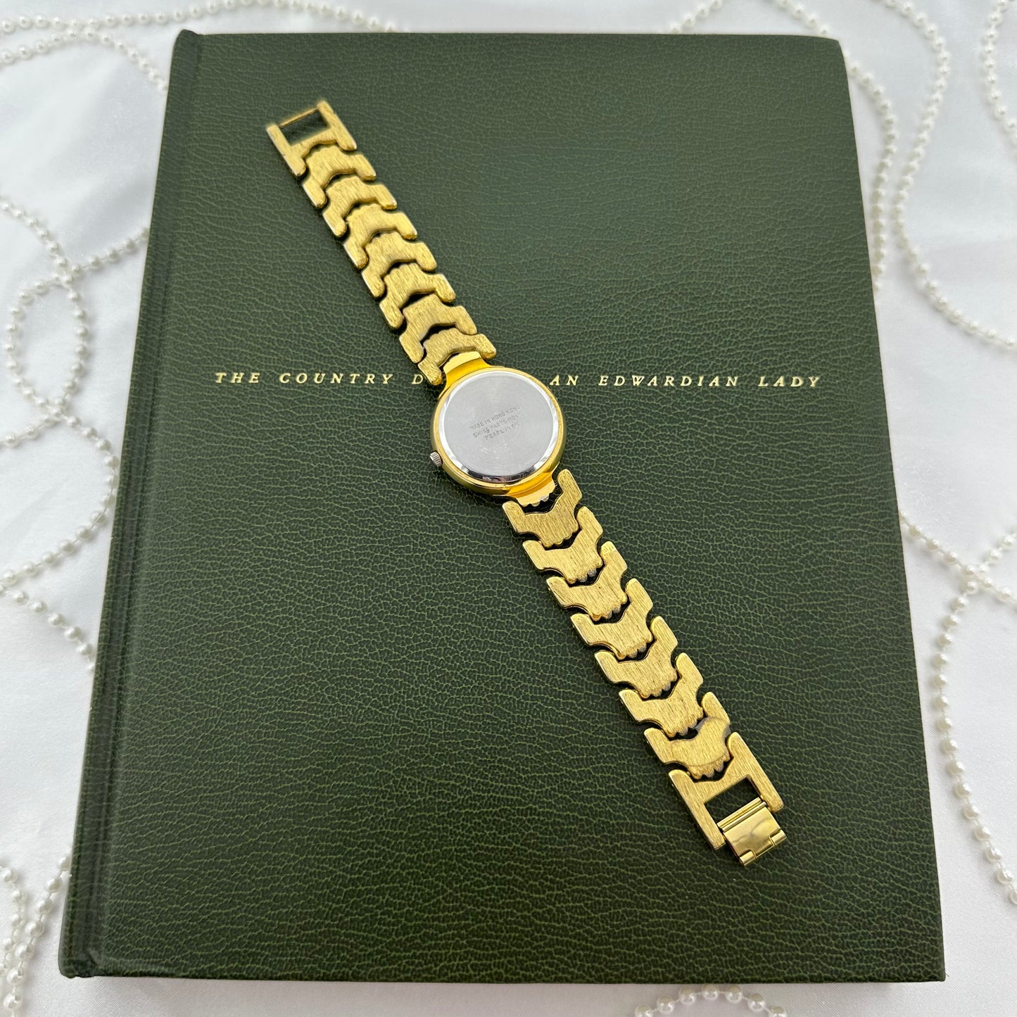 Two-Tone Pearl Watch with Large Round Dial and Date Display