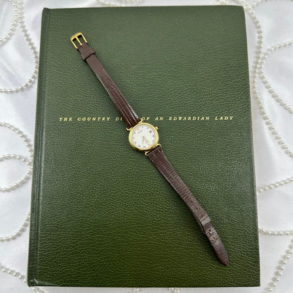 Vintage Gold Pulsar Watch with Brown Leather Band and Date Display