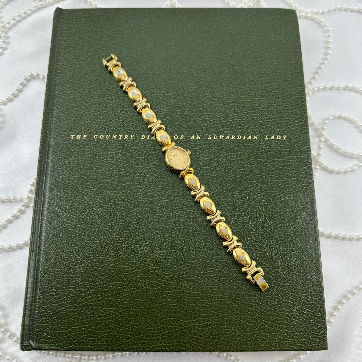 1990's Vintage Gold Pulsar Watch with Oval Dial