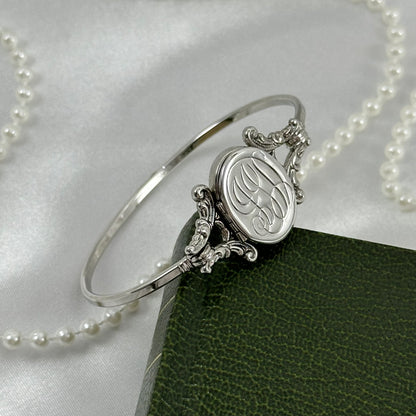 1970's Vintage Silver Avon Hidden Locket Bangle