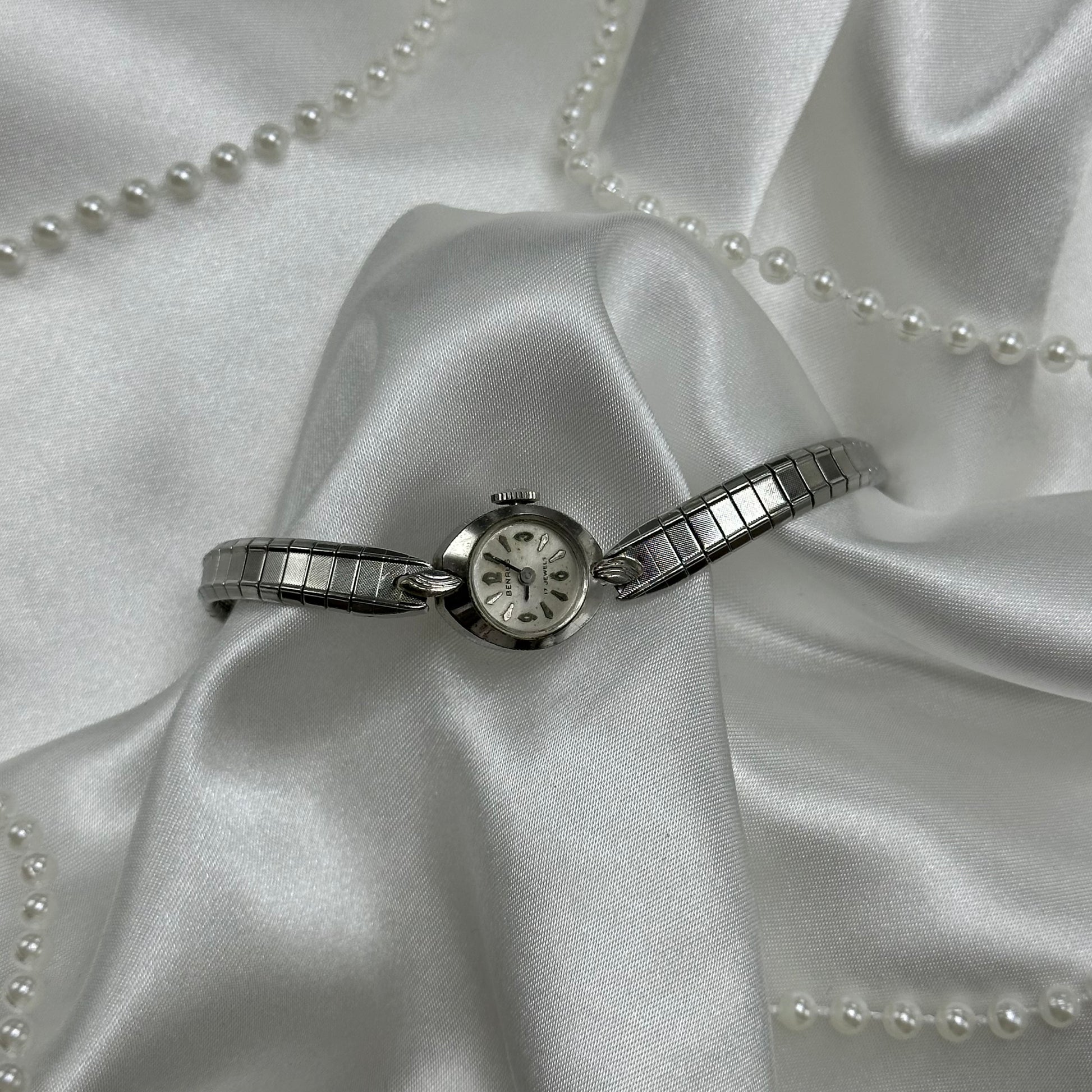 Dainty silver tone Benrus 17 Jewels manual winding watch