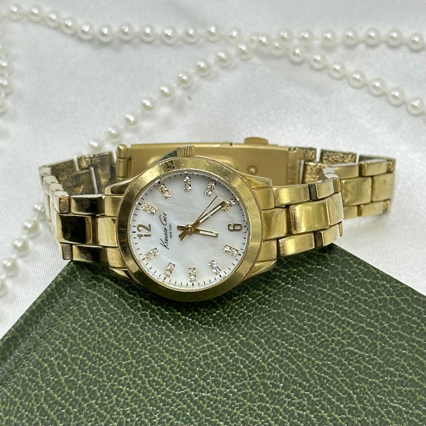 Gold Kenneth Cole Vintage Tank Watch with Mother of Pearl Dial
