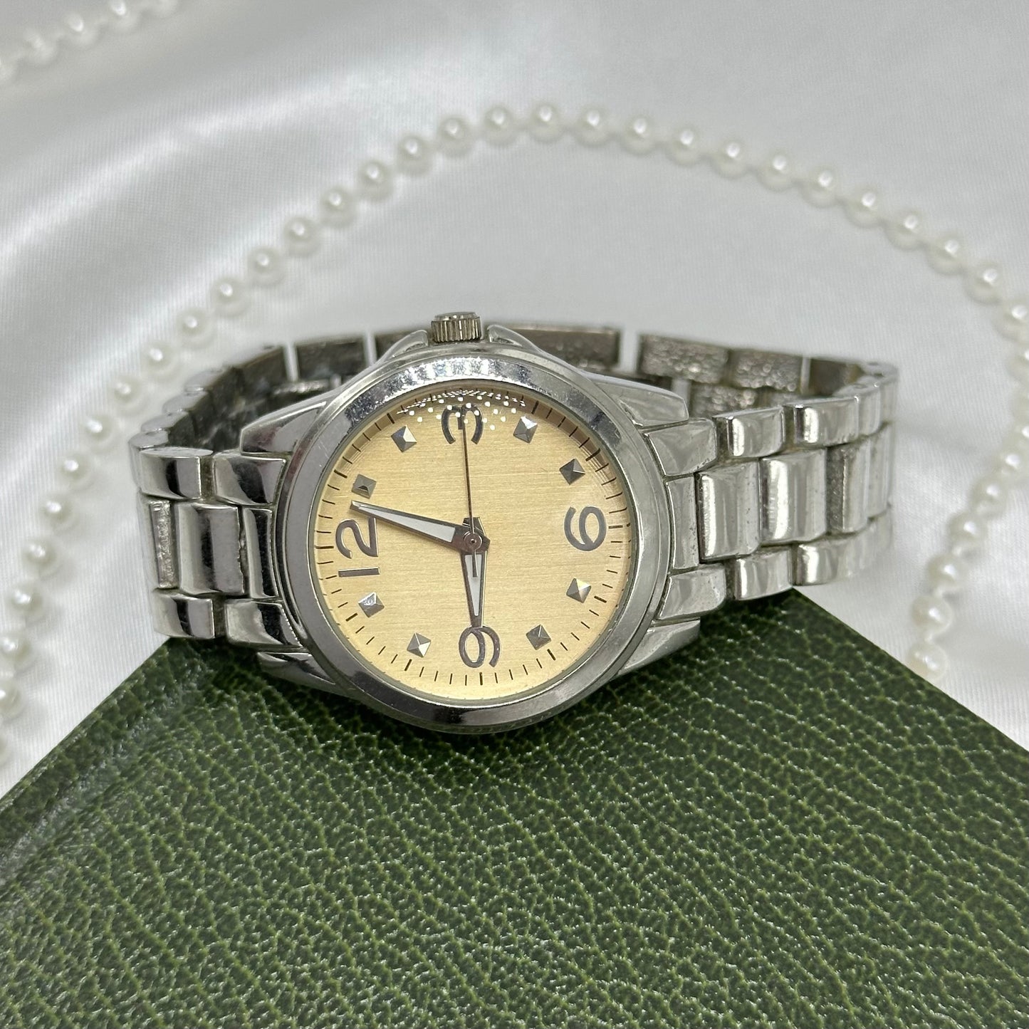 Silver Round Champagne Dial Watch